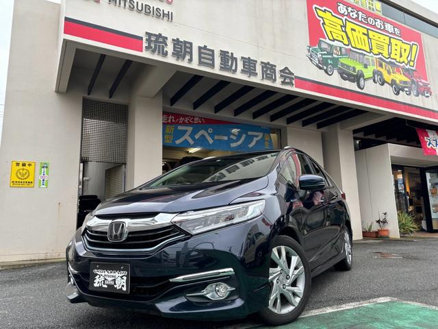 沖縄県中頭郡読谷村の中古車ならシャトル ハイブリッドＺ　ホンダセンシング　キーレスエントリー　スマートキー　盗難防止システム　衝突安全ボディー　衝突軽減ブレーキ　アイドリングストップ　レーンアシスト　クリアランスソナー　ＬＥＤ　シートヒーター　バックカメラ