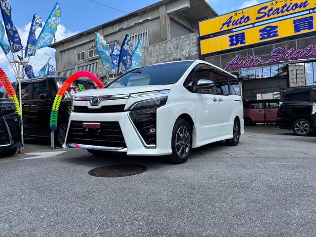 沖縄県の中古車ならヴォクシー ＺＳ　煌ＩＩ　ＴＶ・Ｂｌｕｅｔｏｏｔｈ・バックカメラ・後席モニター・両側パワースライドドア・キーレスエントリー・スマートキー・クリアランスソナー・ＬＥＤヘッドランプ・フルフラット・ウォークスルー