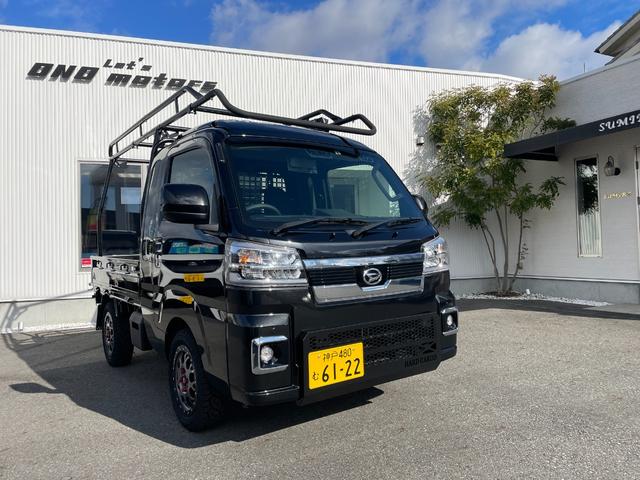 ジャンボエクストラ　４ＷＤ　ＨＡＲＤＣＡＲＧＯ　キャリア＋サイドオーニング　ガード　ゲート　スキッドグリル　マッドフラップ　エクストリーム－Ｊ・ＸＪ０４＋ジオランダー（４本）（１６５／６５／Ｒ１４）　ユーティリティパネル