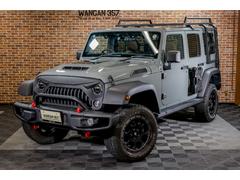 ジープ・ラングラーアンリミテッド サハラ 盗難防止システム オートエアコン サンルーフ リフトUP パワーウィンドウ クルコン 4WD ABS オートライト エアバッグ サイドSRS メンテナンスノート 助手席エアバック 中古車画像