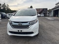 フリードハイブリッド ハイブリッド・Gホンダセンシング 4WD ドライブレコーダー ETC バックカメラ ナビ TV オートクルーズコントロール レーンアシスト 衝突被害軽減システム 両側電動スライドドア オートライト LEDヘッドランプ スマートキー 中古車画像