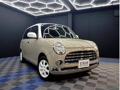 ミラジーノ プレミアムL フィガロ純正色トパーズミスト/ホワイトツートン全塗装 新品DPオーディオ 新品本革調シートカバー momoステアリング ETC バックカメラ 純正アルミホイールホワイト塗装 LEDヘッドライト 中古車画像