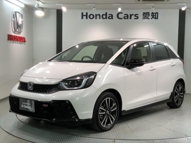 ホンダ フィット ｅ：ＨＥＶＲＳ　ＨｏｎｄａＳＥＮＳＩＮＧ新車保証試乗禁煙車　整備記録簿　盗難防止