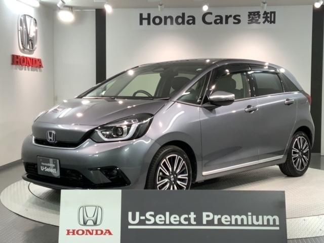 フィット(ホンダ) ｅ：ＨＥＶリュクス　ＨｏｎｄａＳＥＮＳＩＮＧ革シ−ト２年保証　ＬＥＤヘッドランプ　シートＨ　バックモニター　地デジフルセグ　整備記録簿 中古車画像