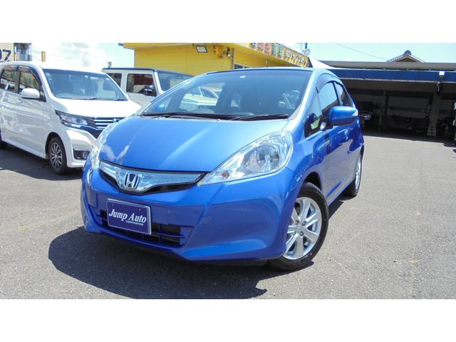 フィットハイブリッド ホンダ スマートセレクション 純正インターｈｄｄナビ 地デジｔｖ ｃｄ録音ｄｖｄ再生バックモニター ディスチャージライト スマートキー パドルシフト付き オートライト 三重県 スマートセレクション 純正インターｈｄｄナビ 地デジｔｖ ｃｄ