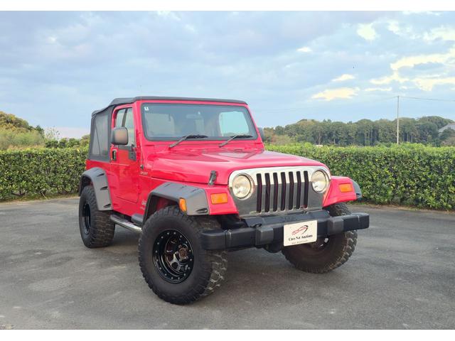 ジープ・ラングラー(ジープ) スポーツ　ディーラー車　４ＷＤ　ソフトトップ　オーバーフェンダー　サイドステップ　車検９年３月　ＥＴＣ 中古車画像