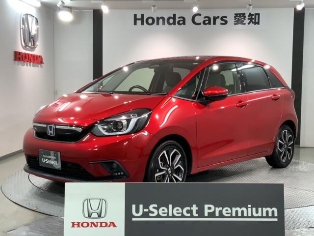 フィット(ホンダ) ｅ：ＨＥＶネス　ＨｏｎｄａＳＥＮＳＩＮＧ　禁煙ワンオーナー　９インチナビＶＸＵ−２０５ＦＴｉ　リアカメラ　ＣＤ　ＤＶＤ 中古車画像