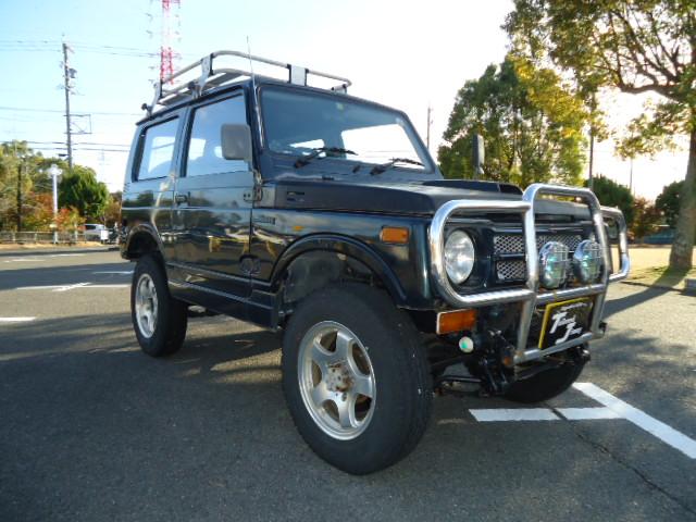 ユーザー買取車　３９．８万円祭り　カスタム多数 構造変更済　大型グリルガード　タイヤジオランダーＧ０１５