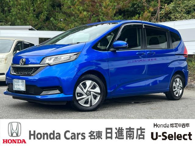 フリードハイブリッド ハイブリッド・Ｇ　ギャザズナビ／センシング／シートヒーター／禁煙車／６人乗／ドアバイザー／ＥＴＣ２．０／パーキングセンサー／両側電動／オートリトラミラー／ＬＥＤヘッドライト／オートエアコン／ロールサンシェイド／（1枚目）