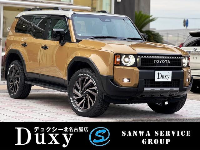 ランドクルーザー250(トヨタ) ZXファーストエディション 丸目型Bi−BeamLEDヘッドランプ JBLプレミアムサウンド モデリスタインチ20AW ハンズフリーパワーバックドア トヨタチームメイト ムーンルーフ 12.3インチディスプレイ パノラマビュー 中古車画像