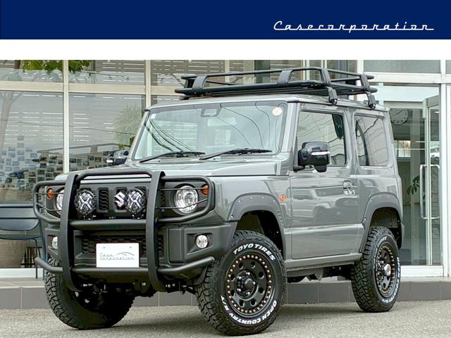 ジムニー XC 10インチフローティングマルチオーディオ 黒レザーシートカバー 1.5インチリフトアップ グリルガード LEDフォグライト リアダラー オーバーフェンダー 16インチAW ルーフラック シートヒーター(1枚目)