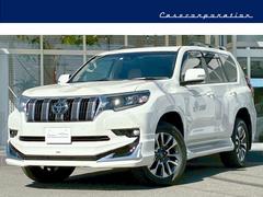 ランドクルーザープラド TX Lパッケージ マットブラックエディション サンルーフ  7人乗 ベージュ革シート 純正19インチAW ディスプレイオーディオ パノラミックビューモニター シートヒーター ルーフレール サイドステップカバー モデリスタエアロ 中古車画像