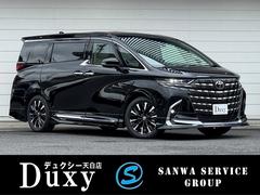 アルファードハイブリッド エグゼクティブラウンジ 内装ニュートラルベージュ 14型コネクトナビ JBLプレミアムサウンド リヤエンターテイメント デジタルミラー 左右独立ムーンルーフ CD/DVDデッキ スペアタイヤ 置くだけ充電 純正19インチAW 中古車画像