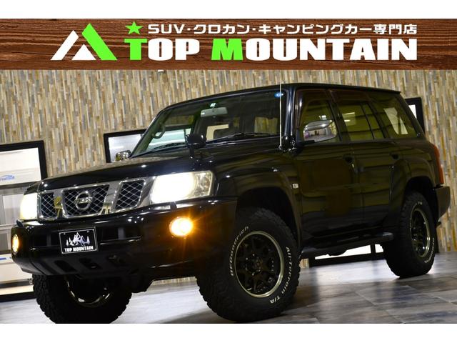 サファリ(日産) グランロードリミテッド　切替４ＷＤ　社外１７インチホイール　ＢＦＧｏｏｄＲｉｃｈオールテレーンタイヤ　ＳＤナビ　フルセグ　Ｂｌｕｅｔｏｏｔｈオーディオ 中古車画像