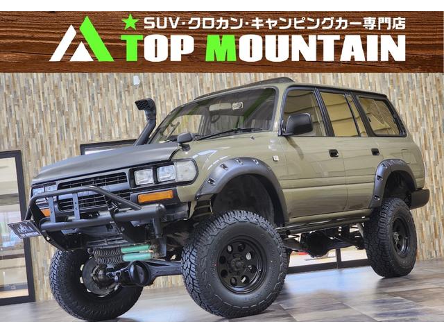 ＶＸリミテッド　４ＷＤ　サンルーフ　サンドカーキ全塗装　リフトアップ　ジムライン　ジオランダーＸ－ＡＴ　社外オーバーフェンダー　シュノーケル　角目ヘッド　バンパーガード　ＨＤＤナビ　革シート　シートヒーター　ＥＴＣ(1枚目)