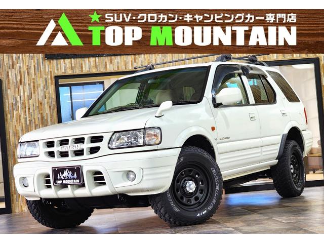 ＬＳ　切替４ＷＤ　リフトアップ　１６インチスチールホイールマットブラックペイント　ブリヂストンマッドタイヤ　ルーフレール　ＩＮＮＯキャリア　ヘッドライトＬＥＤ化
