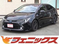 カローラ ハイブリッド ダブルバイビー50ミリオンエディション★純正 9インチナビ★CD,DVD再生★Bluetooth★ステアリングリモコン★コムテックドラレコ★革巻ステアリング★LEDオートライト★LEDフォグ★ローダウン★ビルトインETC2.0★ハーフレザーシート 中古車画像