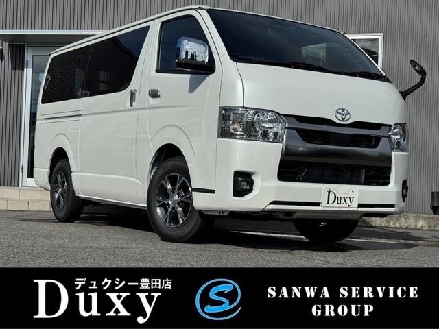 ハイエースバン ロングスーパーGL ダークプライムS 【即納!特別仕様車!!】 パノラミックビューモニター! デジタルインナーミラー 両側パワースライドドア レーンディパーチャーアラート AC100V電源 ハーフレザーシート 20周年限定スカッフプレート(1枚目)