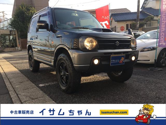 ランドベンチャー 禁煙車 4WD オフロードタイヤ ターボ ETC ナビ DVD シートヒーター ハーフレザーシート 純正16インチAW(1枚目)