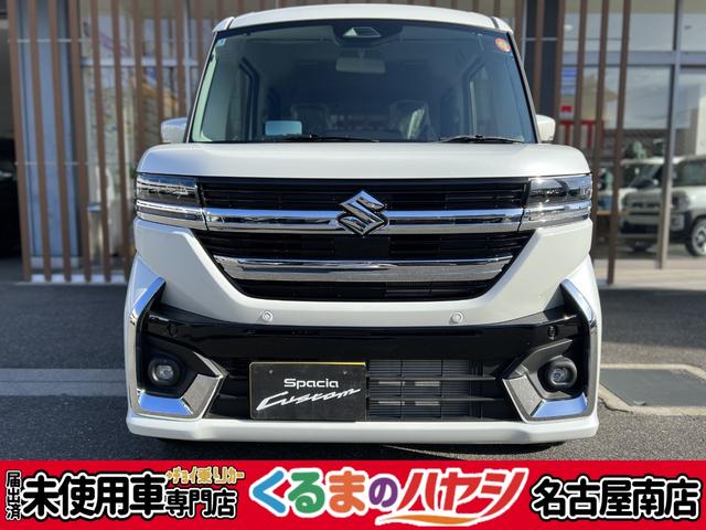 スペーシアカスタム（スズキ）ハイブリッドＸＳ　・届出済未使用車・２ＷＤ・ＣＶＴ・両側電動スライドドア・ＵＳＢ電源・アルミホイール・パーソナルテーブル・ＬＥＤヘッドライト・電動パーキング・ブレーキホールド・シートヒーター・オットマン 中古車画像