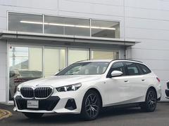 5シリーズ 523iツーリング Mスポーツ 試乗車・コンフォートDPKG・19インチAW  AppleCarPlay・アンビエントライト・全方位カメラ・Aサスペンション・純正TV・オートホールド・シートヒーター・電動リアゲート・ミラーETC 中古車画像
