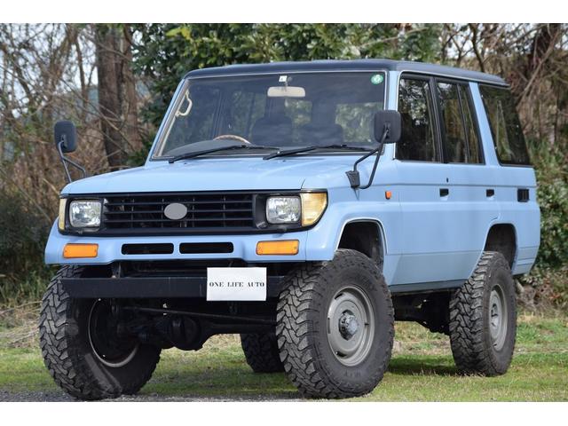 ランドクルーザープラド(トヨタ) ＳＸワイド　４ＷＤ　リフトアップ　ディーゼルターボ　オープンカントリーＭ／Ｔ　バン登録　シートカバー 中古車画像