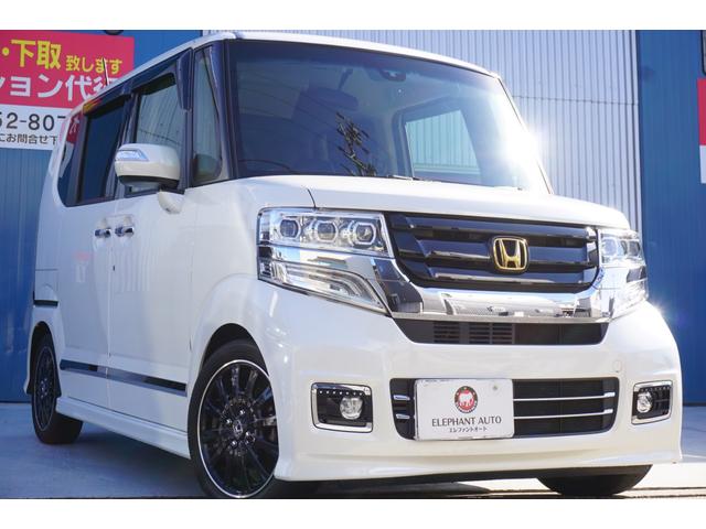 ホンダ ｎ ｂｏｘカスタムｇ ターボｓｓブラックスタイルパッケージ 両側電動スライドドア カスタムヘッドライト ｌｅｄテールランプ ローダウンサス 純正メモリーナビゲーション バックカメラ フリップダウンモニター 黒半革シート ヒーター ｃｔｂａ ｅｔｃの中古車