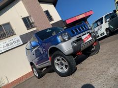 ジムニー FISフリースタイルワールドカップリミテッド ターボ 4WD リフトアップ 社外アルミホイール タイミングチェーン式 車検2年 中古車画像