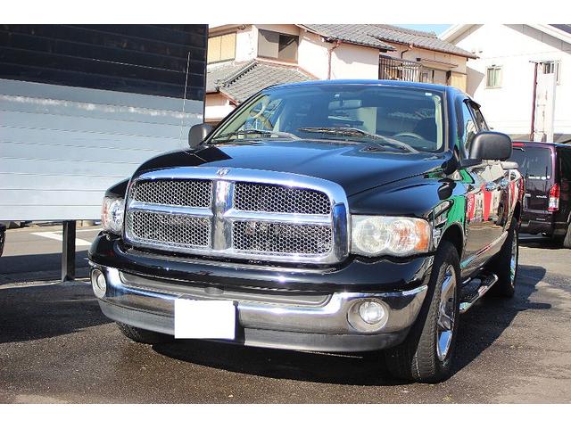 トラック　５．７ＨＥＭＩ　ＳＬＴ　クワッドキャブ　社外ＨＤＤナビ・ＴＶ　バックカメラ　ハードトノカバー　サイドステップ　社外マフラー　ベンチコラム　キーレス　ＥＴＣ　オートクルーズ　サイクルキャリア
