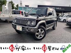 パジェロミニ スヌーピーエディションII ターボ 4WD 禁煙 キーレス 背面タイヤ 4WD サイドバイザー AC PS 保証付き 中古車画像
