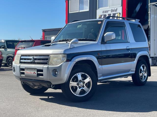 パジェロミニ(三菱) ナビエディションＶＲ　４ＷＤ　ＥＴＣ　ナビ　ＴＶ　キーレスエントリー　電動格納ミラー　ＡＴ　盗難防止システム　ＡＢＳ　ＣＤ　ＤＶＤ再生　ルーフレール　アルミホイール　衝突安全ボディ　エアコン　パワーステアリング 中古車画像