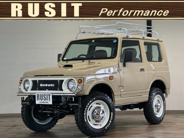 ジムニー ランドベンチャー　サンドベージュ全塗装済み　４ＷＤ　メッキルーフ・キャリア　ＷＡＮＰＡＫＵ　Ｍ／Ｔ新品タイヤ　輸出用ホイール　ＳＵＺＵＫＩエンブレム　前後社外バンパー　社外グリル　リフトアップ済み（1枚目）