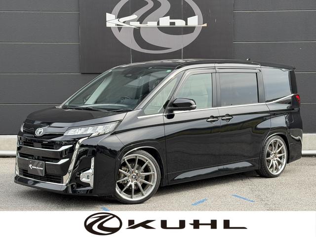 ノア(トヨタ)G ワンオーナー KUHLオリジナルKCV02アルミ KRUISE9mmオーバーフェンダー インテックLEDテールランプ パノラミックビューモニター ディスプレイオーディオPlus 快適利便パッケージ 中古車画像