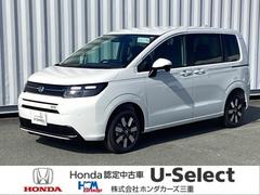 フリード e:HEVエアーEX 試乗車 4WD ホンダ純正11インチインターナビ Bluetooth 地デジ DVDビデオ バックカメラ パーキングセンサー 両側電動スライドドア シートヒーター スマートキー LEDヘッドライト 中古車画像