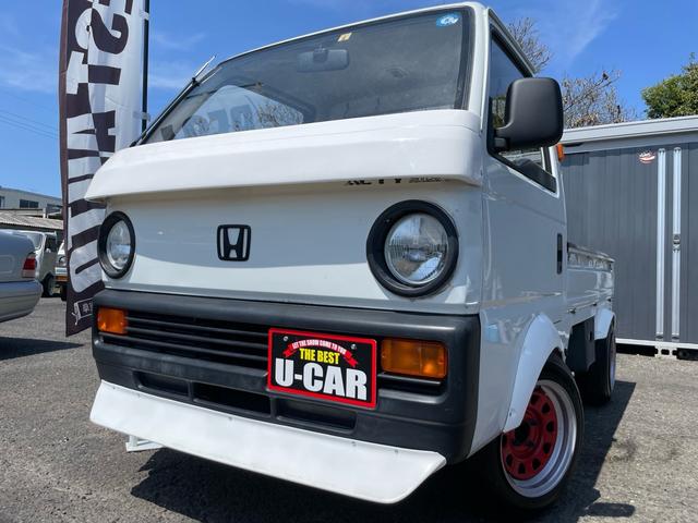 ＳＤＸ　車検整備付　マニュアル（ＭＴ）　社外オーバーフェンダー　チンスポ　ワイパーガード　ミラーカバー　１３インチホイール　引っ張りタイヤ　丸目ヘッドライト　平成２年式軽トラック　実走行