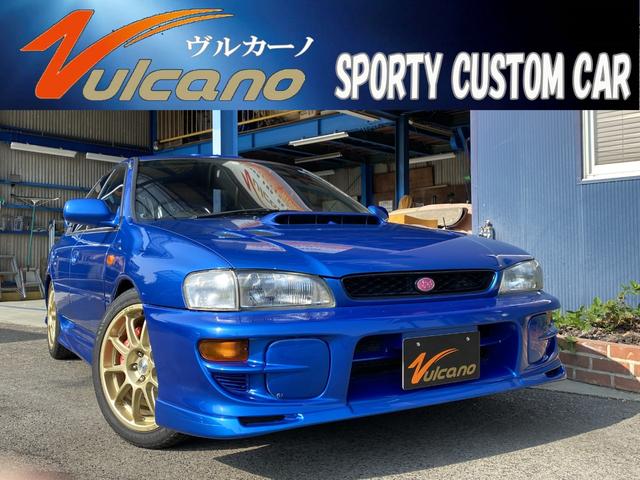 インプレッサ ＷＲＸタイプＲＡ　ＳＴｉバージョンＩＶ　Ｖ－Ｌｉｍｉｔｅｄ　ＤＣＣＤ　全長式車高調　Ｓｔｉフロントアンダースポイラー　Ｓｔｉ大型リアスポイラー　Ｓｔｉマフラー　社外三連メーター　モモステ　ルーフベンチレーション（1枚目）