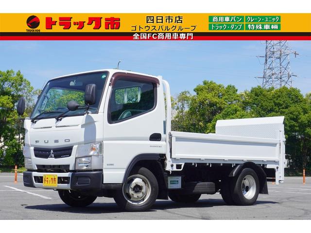 キャンター １．５ｔ　平ボディ　フルフラットロー　パワーゲート　垂直式　１．５ｔ積載　全低床　垂直式パワーゲート　極東開発　Ｖ６０１Ｂ－４ＭＫＴ１　集中ロック　エコモード　荷台板張り　荷台内寸３０７／１６０／３９　荷台高８４　リフト内寸９０／１５８　車両総重量３９４５ｋｇ（1枚目）