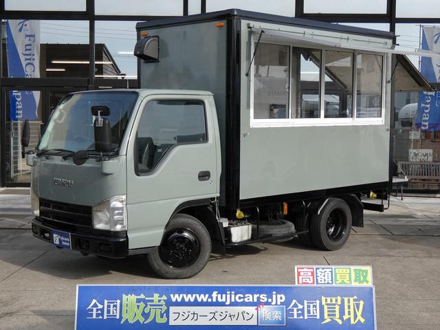 ディーゼル 4WD 移動販売車 キッチンカー ケータリングカー 跳ね上げ式販売口 3槽シンク 200L給排水タンク ガス式フライヤー 換気扇 キッチンパネル 4枚サッシ フローリングフロア(1枚目)