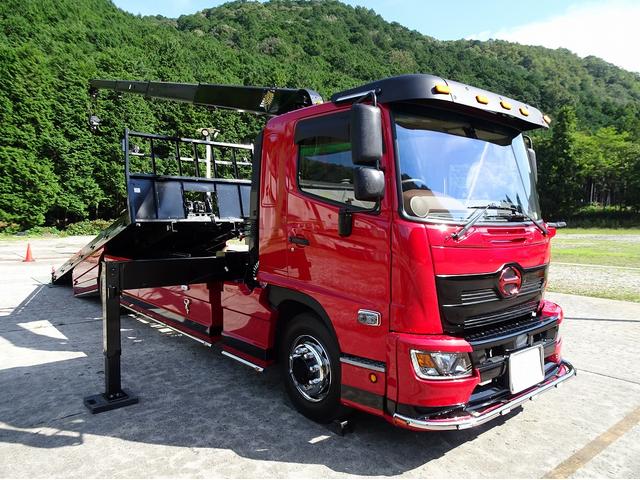 ヒノレンジャー 　増トン　４段セルフクレーン付　スライドローダー　一般型　６．４トン積載　横根太増し　標準幅　ベッド付　５．９ｍ長ボディ　油圧式リヤゲート　２６０馬力（1枚目）