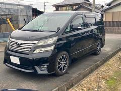 ヴェルファイア 2.4Z プラチナセレクションII バックカメラ TV クリアランスソナー 両側電動スライドドア HID 電動リアゲート スマートキー 電動格納ミラー 3列シート オットマン CVT アルミホイール 盗難防止システム 衝突安全ボディ 中古車画像