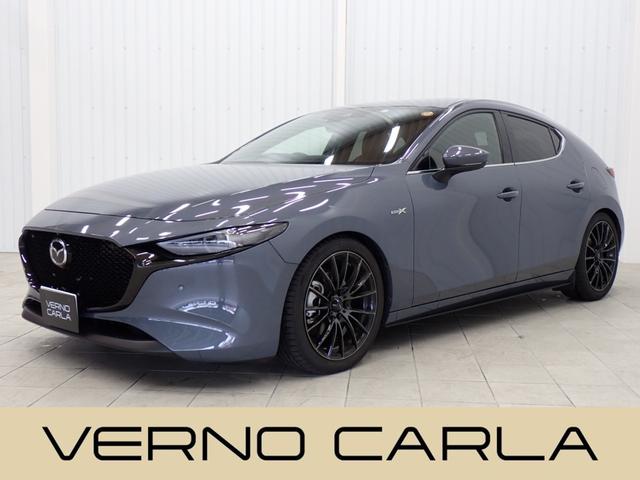 ＭＡＺＤＡ３ファストバック Ｘバーガンディ　セレクション　４ＷＤ・柿本改マフラー・ＴＥＩＮ車高調・ＷｅｄｓＳｐｏｒｔアルミ・マツダコネクト・障害物センサー・全方位カメラ・赤本革・ＨＵＤ・電動シート・シートヒーター・ＬＥＤライト・純正ナビ・ＴＶ・ＤＶＤ再生（1枚目）