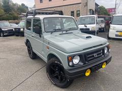 ジムニー ワイルドウインド タイヤ新品 モスグリーン/ホワイト 車検整備付 4WD ラック フォグ 背面ハードタイヤカバー オートマ 中古車画像