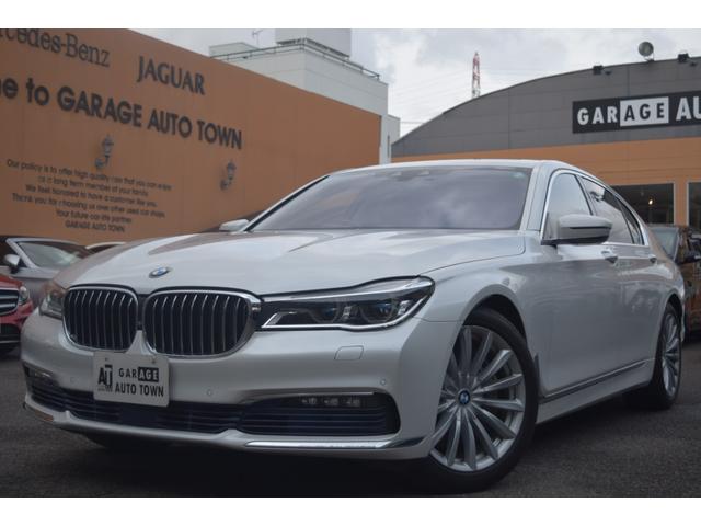 ７５０ｉ　純正ＨＤＤナビ地デジＴＶ　サンルーフ　キャメルレザーシート　フロント／サイド／バック／３６０°カメラ　ＨＵＤ　ｈａｒｍａｎ／ｋａｒｄｏｎ　インテリジェントセーフティー　ジェスチャーコントロール