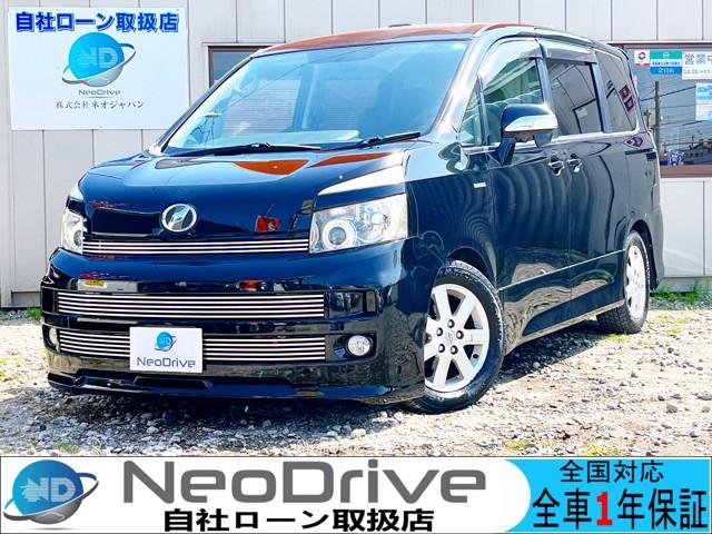 ヴォクシー ＺＳ　４ＷＤ　自社ローン取り扱い　ＭＹＮＥＯオートローン　完備　１年保証付☆☆寒冷地仕様☆純正ナビ☆両側パワースライドドア☆バックカメラ☆フルセグ☆リアヒーター☆サンルーフ☆ローダウン☆札幌　函館　北海道（1枚目）