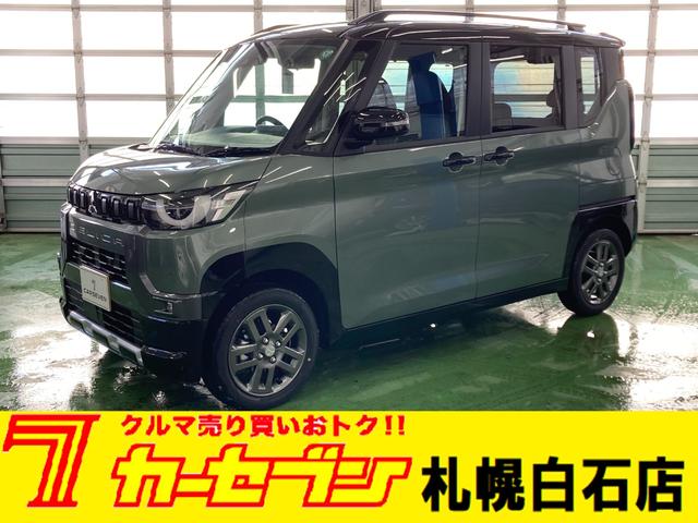 デリカミニ Ｔ　プレミアム　４ＷＤ　届出済未使用車　全方位カメラ　デジタルルームミラー　両側電動スライドドア　ハンドルヒーター　シートヒーター　ベンチシート　リアサーキュレーター　マイパイロット（1枚目）