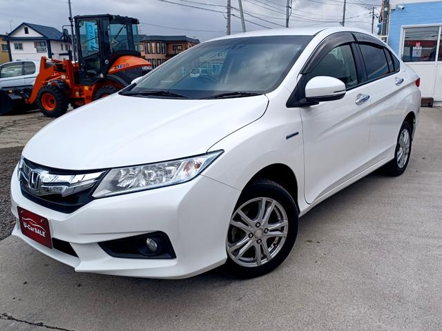 グレイス(ホンダ) ハイブリッドＥＸ　４ＷＤ／純正ナビ／ＴＶ／Ｂｌｕｅｔｏｏｔｈ／バックカメラ／衝突被害軽減ブレーキ／ＬＥＤライト／クルーズコントロール／パドルシフト／シートヒーター／サイドエアバッグ／横滑り防止装置／法定点検整備付 中古車画像