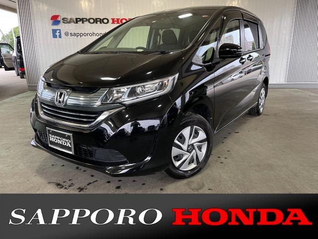 フリードハイブリッド ホンダ ハイブリッド ｇホンダセンシング ４ｗｄ 純正９インチナビ バックカメラ ブルートゥース フルセグ 両側電動スライドドア ｌｅｄヘッドライト オートライト ｅｔｃ シートヒーター ロールサンシェイド アクティブコーナリングライト