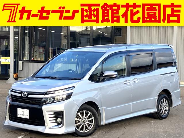 ヴォクシー(トヨタ) ＺＳ　４ＷＤ／ＴＲＤエアロ／寒冷地仕様／地デジナビ／Ｂカメラ／ＥＴＣ 中古車画像