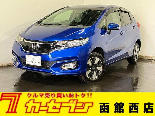 フィットハイブリッド(ホンダ) Ｆ　４ＷＤ　寒冷地仕様　ＥＴＣ　バックカメラ　社外ナビ　ワンセグＴＶ 中古車画像