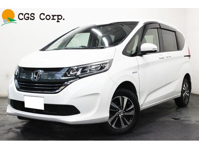 フリード＋ハイブリッド(ホンダ) ハイブリッドＧ・ホンダセンシング　４ＷＤ　本州仕入車　両側パワースライドドア　ナビ　バックカメラ　ｂｌｕｅｔｏｏｔｈ　スマートキー　プッシュスタート　衝突被害軽減ブレーキ　ＥＴＣ 中古車画像